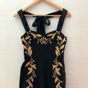 Black and gold mini dress Free People size zero.